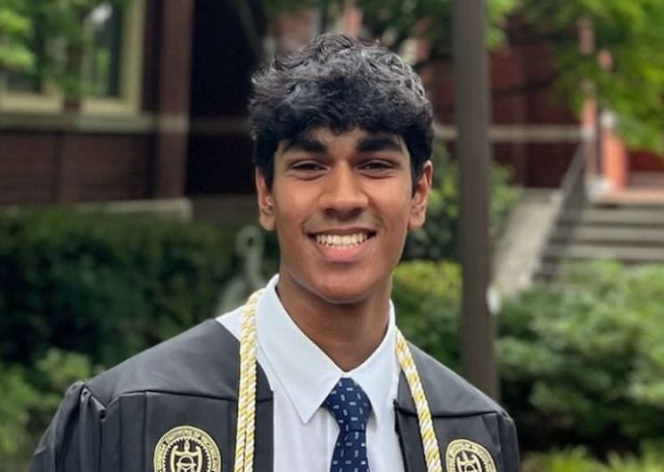 cropped_745x529 Yashas in graduation outfit standing outside